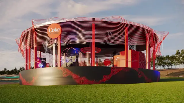 O espaço Coke Studio: Fachada ao entardecer com o disco Coke Studio