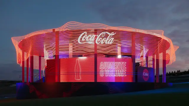 O espaço Coke Studio: Fachada frontal com o painel Aumente o Volume, à noite
