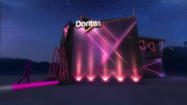 Fachada iluminada com o X de neon